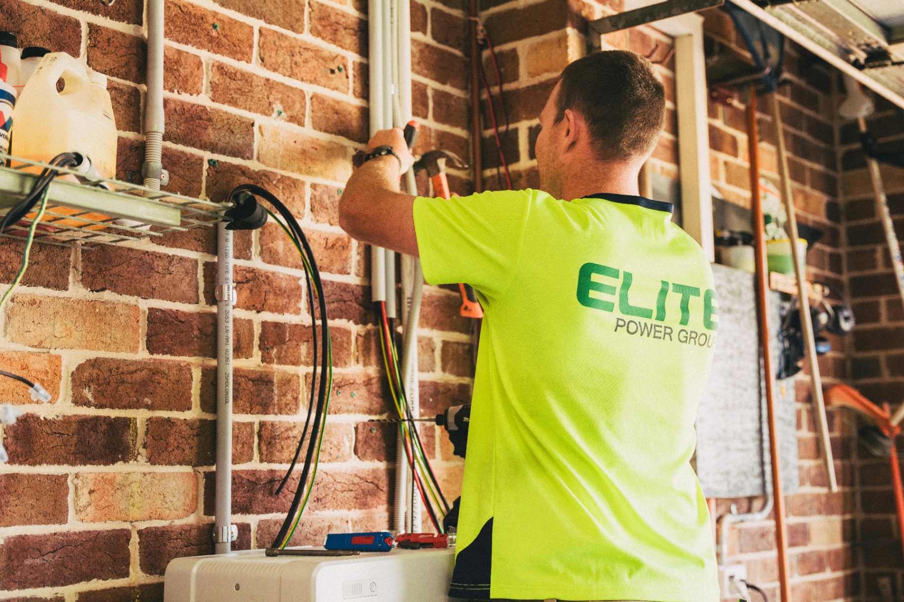 Licensed electrician wiring a residential job