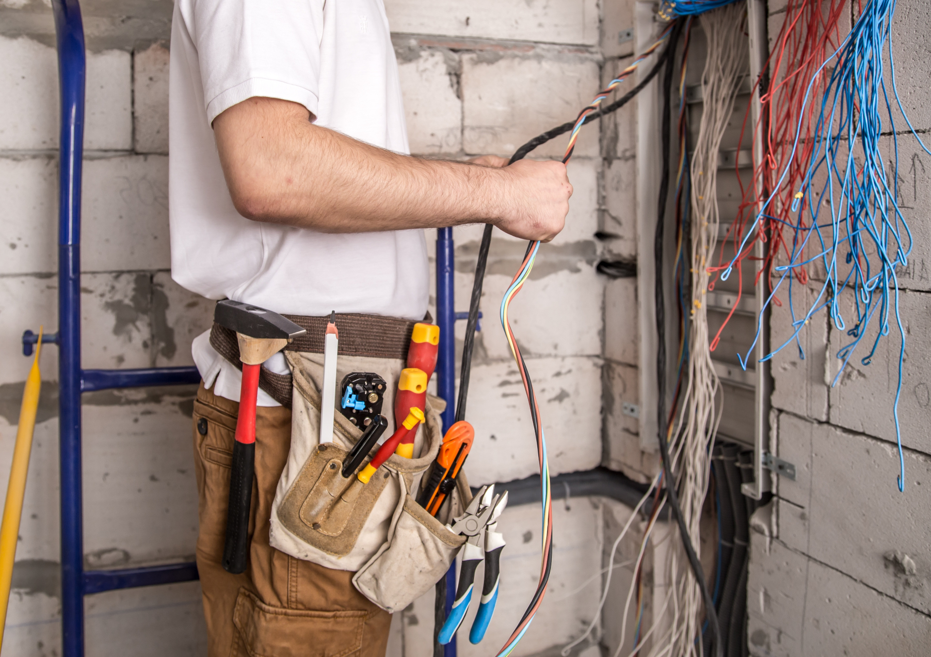 Electrician working on wiring